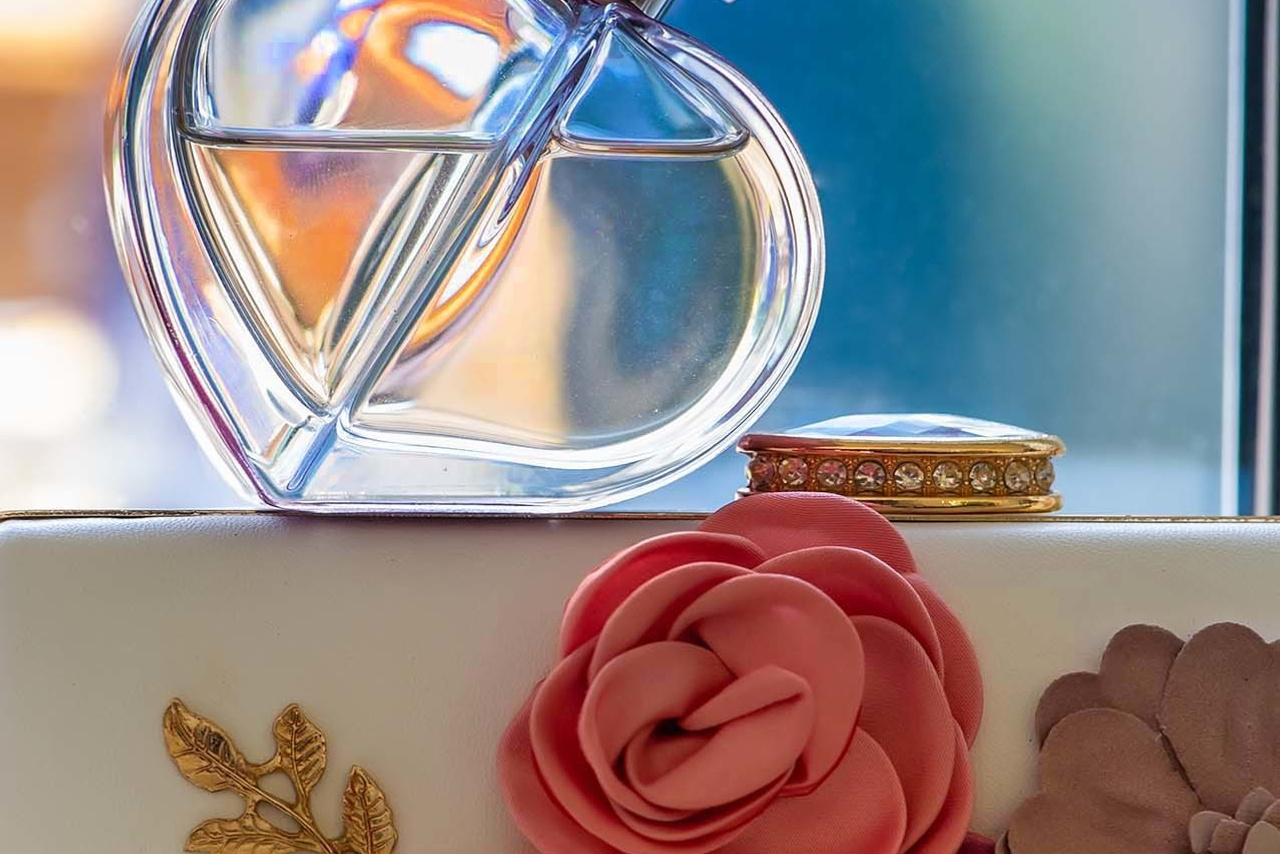 Wedding photographer Jockey Club, Sandown Park UK Nikon D850 bride's purse and perfume