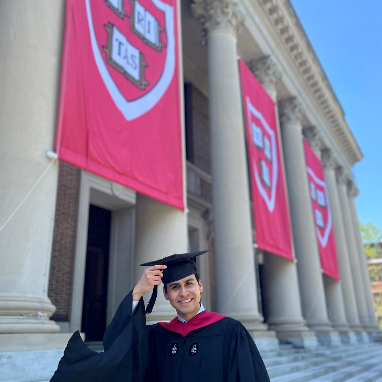 Masters graduation with Zeke