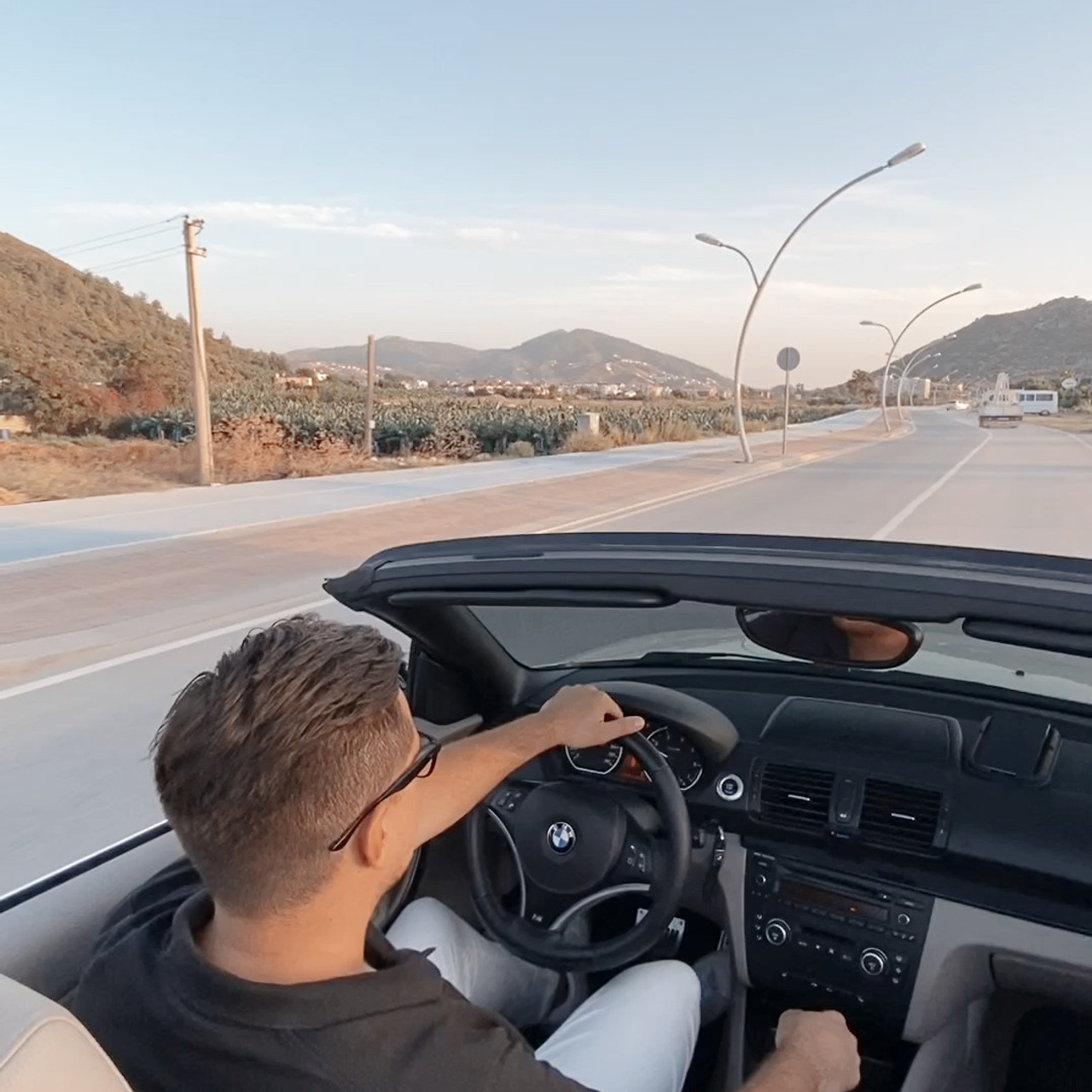 Filming for content with a cabriolet. Alsu Develi, Photographer in Turkey, Alanya, Side, Belek, Antalya, Kemer, Turkiye. Photoshooting in Alanya. Photosession in Belek, Side