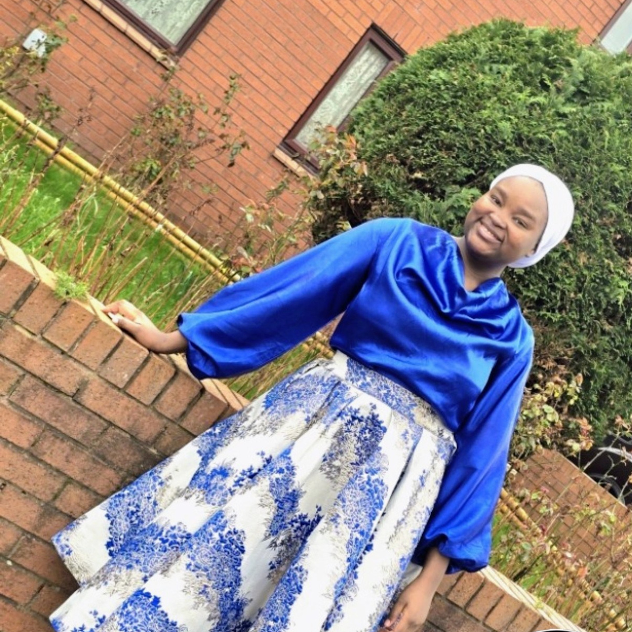 Ordered this white pleated turbancap for her child’s dedication.