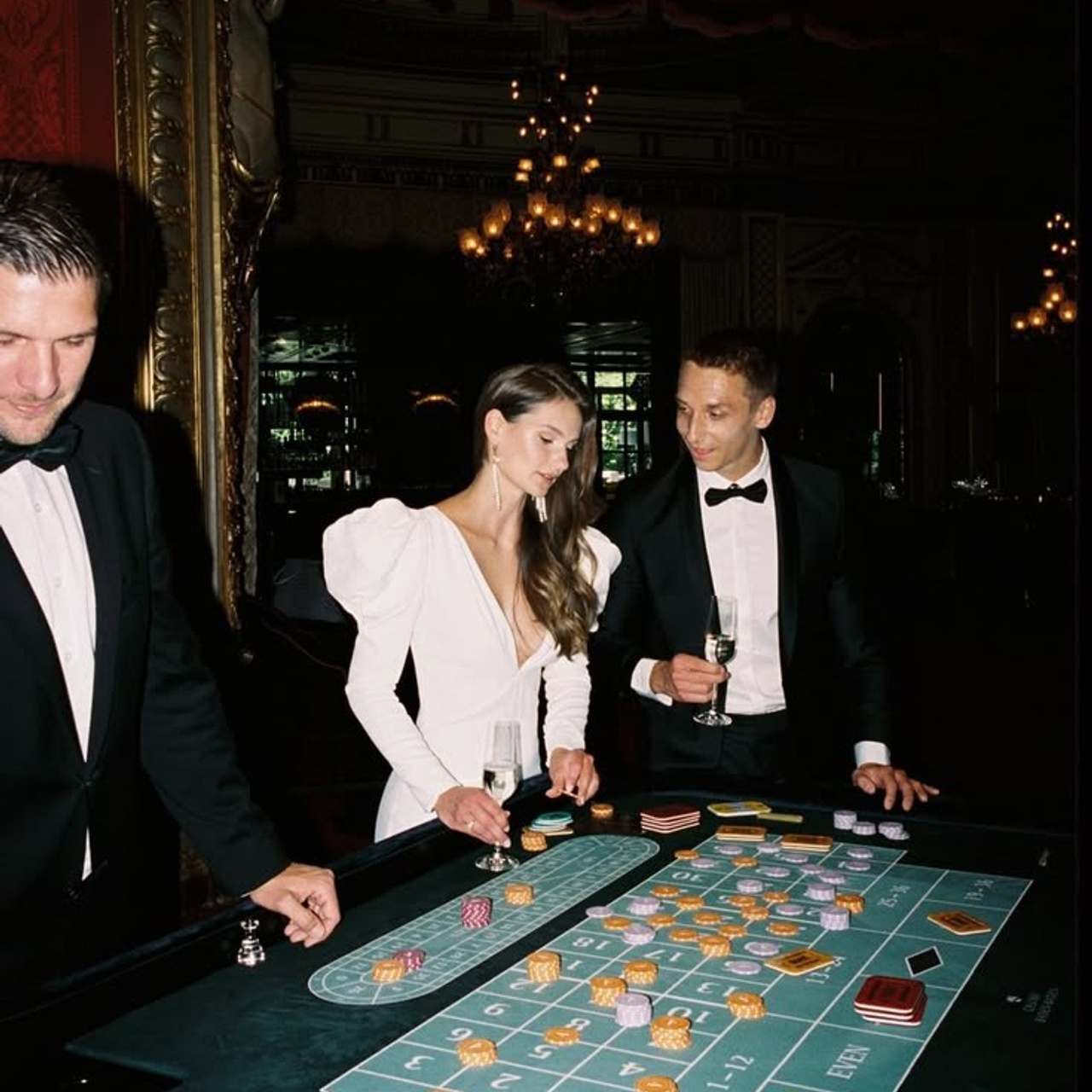 Casino Royale inspired wedding editorial with bride and groom at a luxury gaming table
