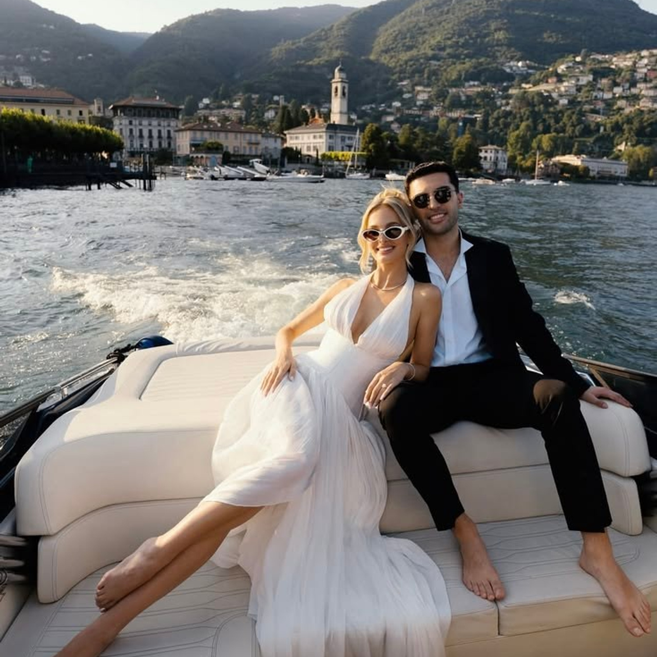 Bride and groom on a luxury boat on Lake Como – destination wedding editorial in Italy