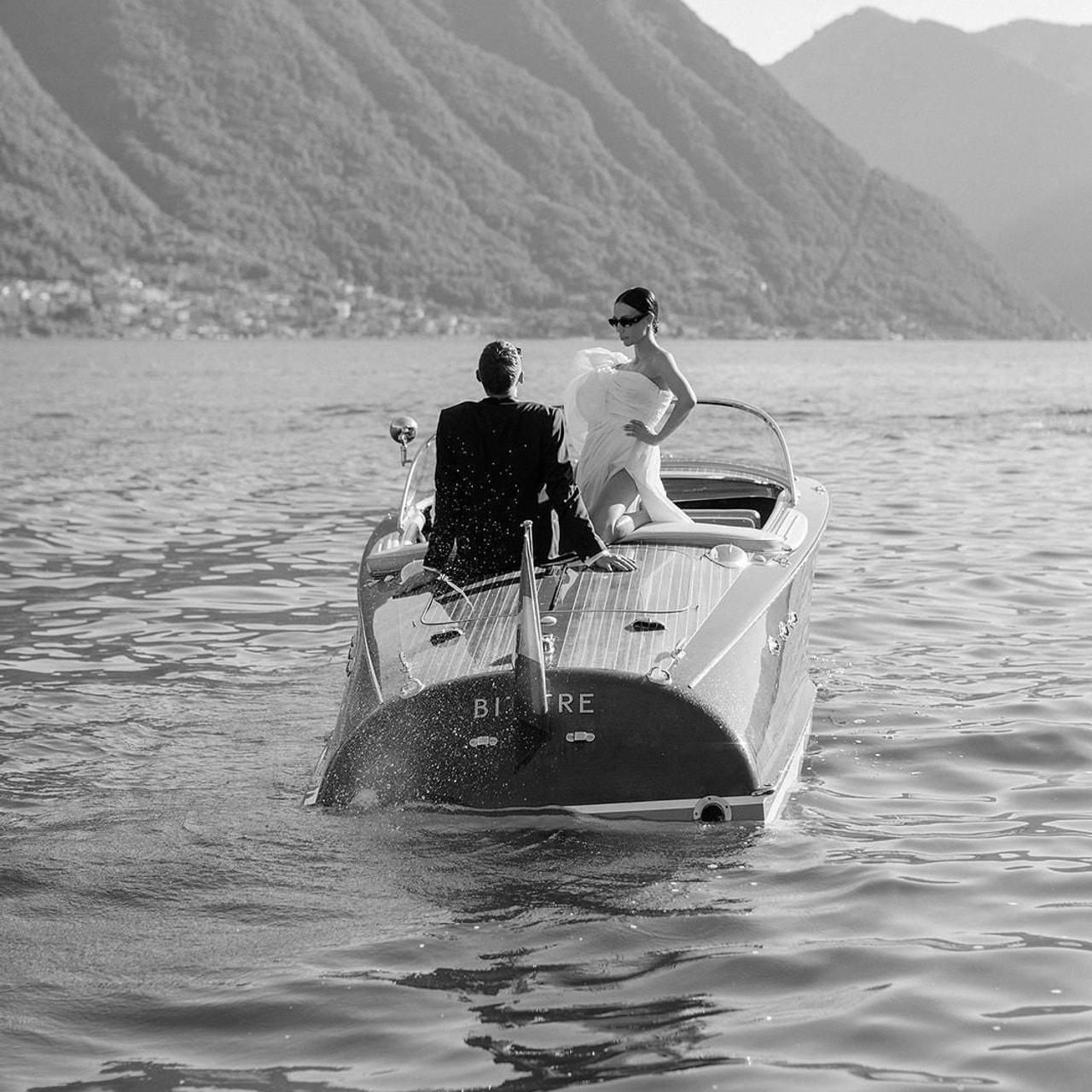 Luxury wedding couple boat session on Lake Como – Italian destination wedding editorial