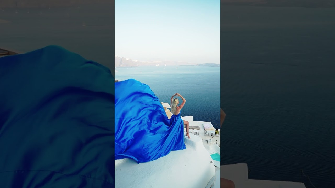 Sky Blue Flying Dress Photoshoot Santorini | Romantic Couple Stroll 2026. Photographer in Santorini SokoLOVE | Flying Dress Santorini