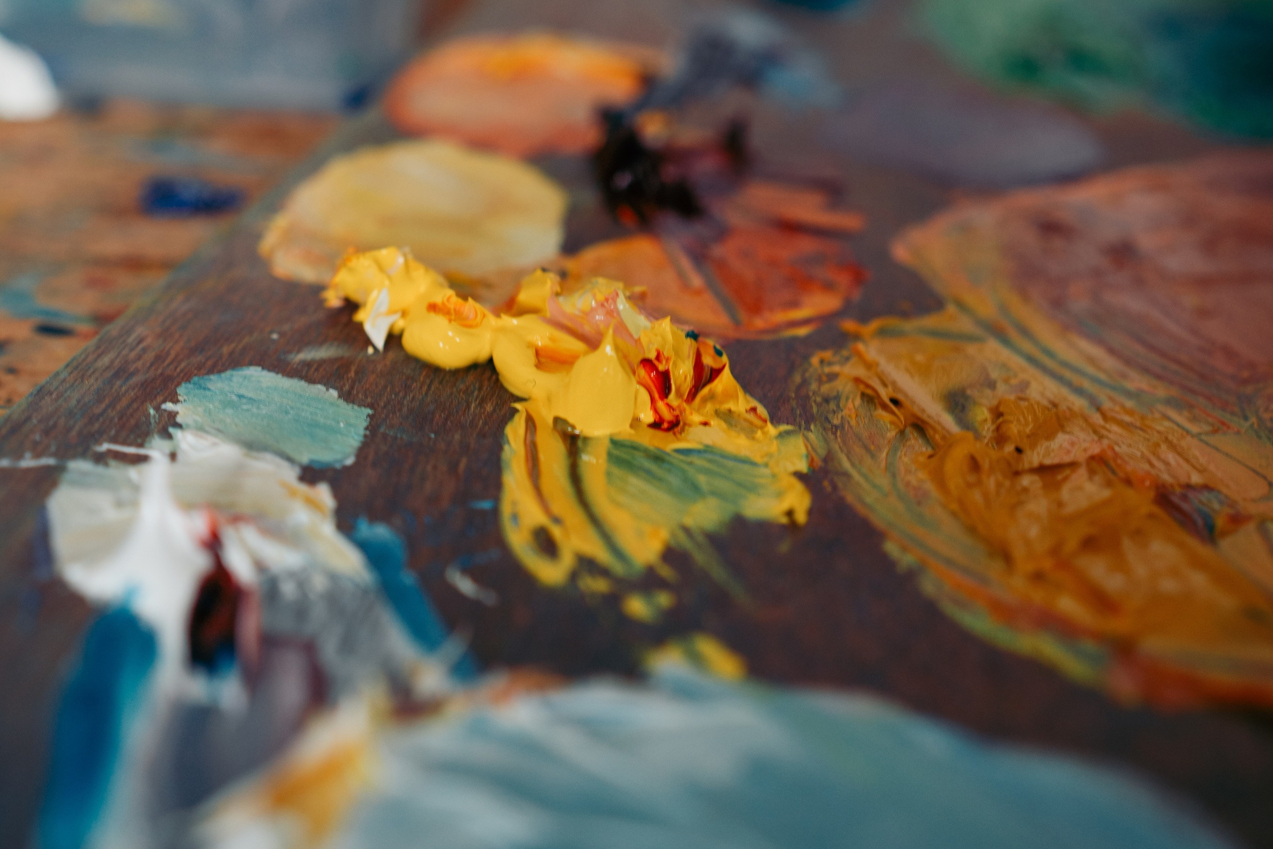 Lady is standing and painting magic. Art and brand photography. 