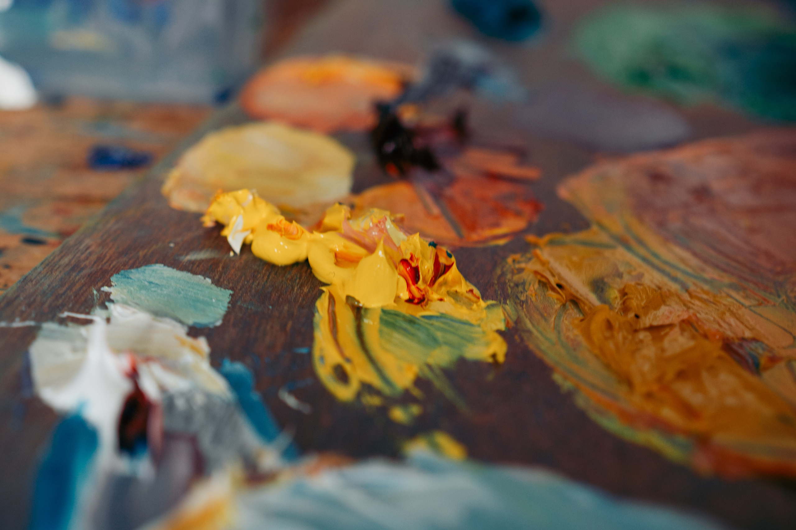 Paints on the pallet. Art and brand photography.