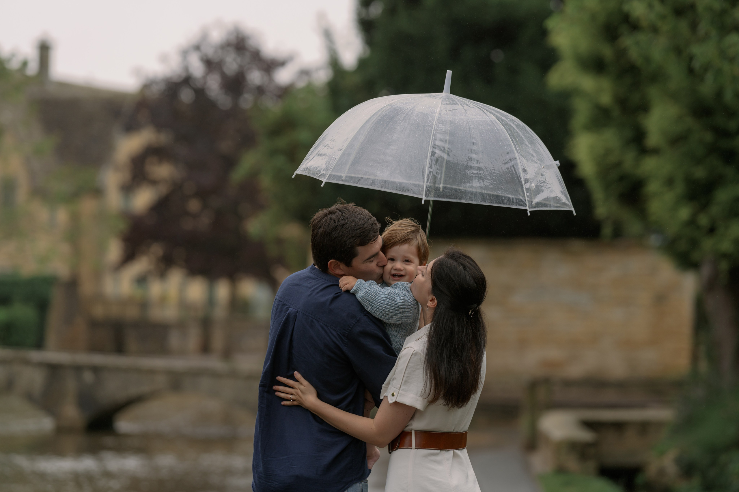 family posing at front of Westminster Abbey