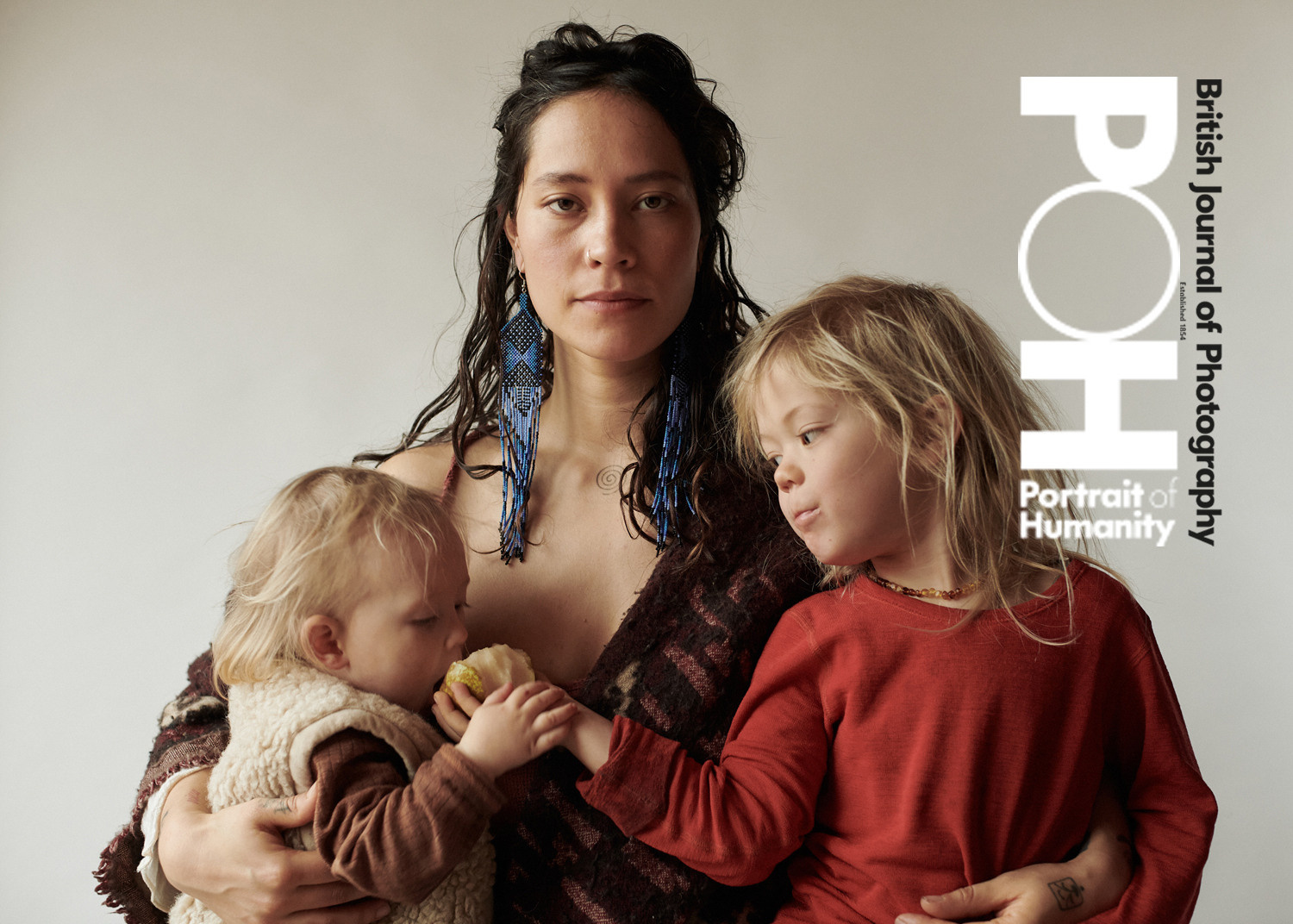 Portrait photographer in Amsterdam and Brussels. A photo of a woman with her kids has been shortlisted this year for the British Journal of Photography.