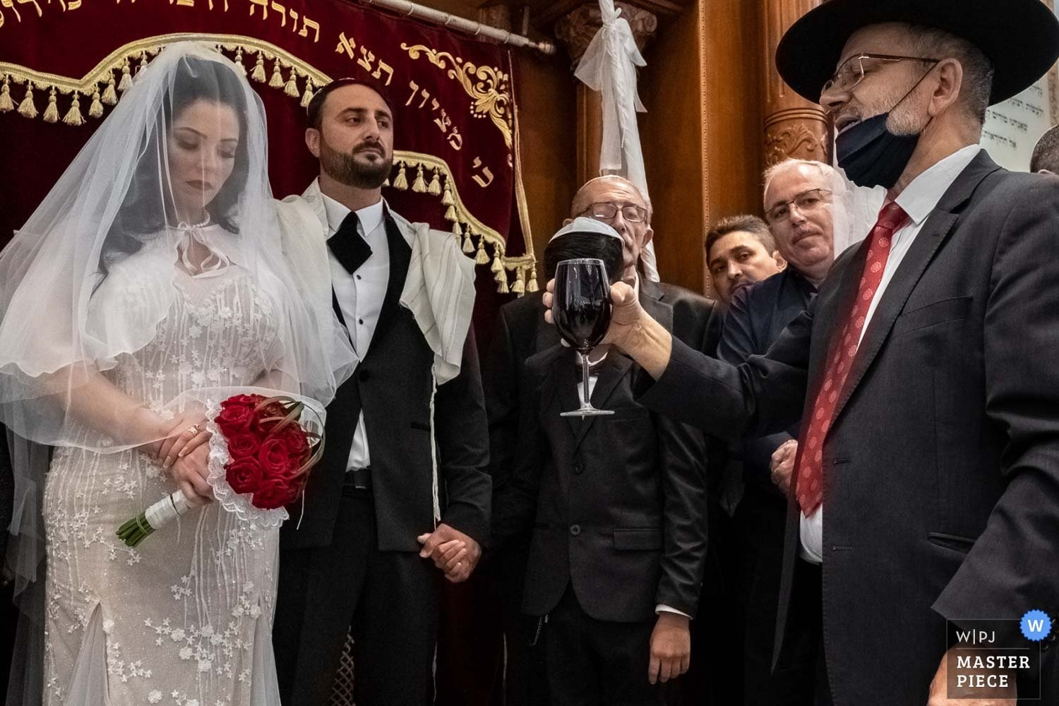 A Jewish wedding ceremony under the chuppah
