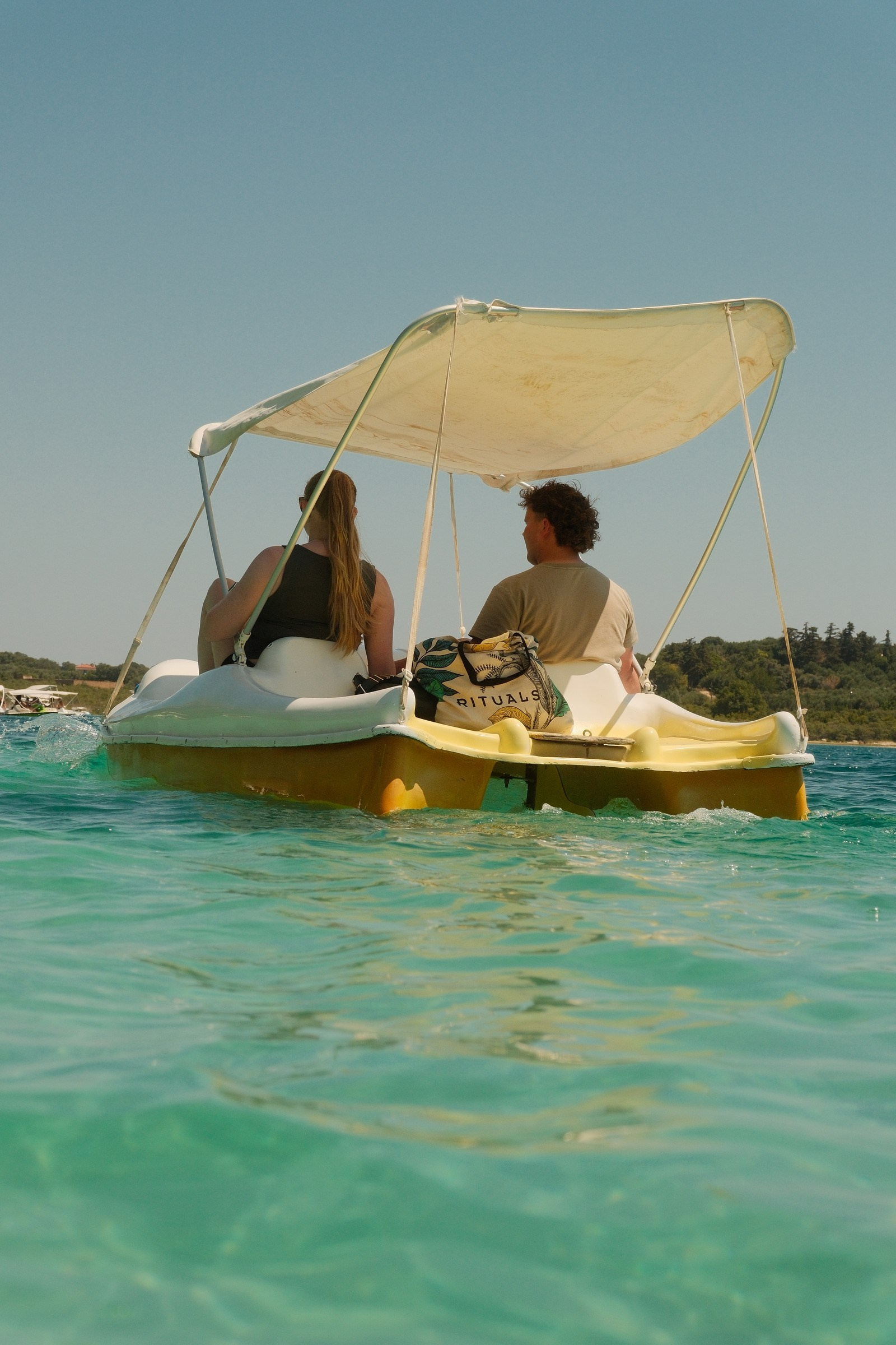 Family pedalo ride on Lake Kournas, Crete, photographed with a Fujifilm X-H2S.