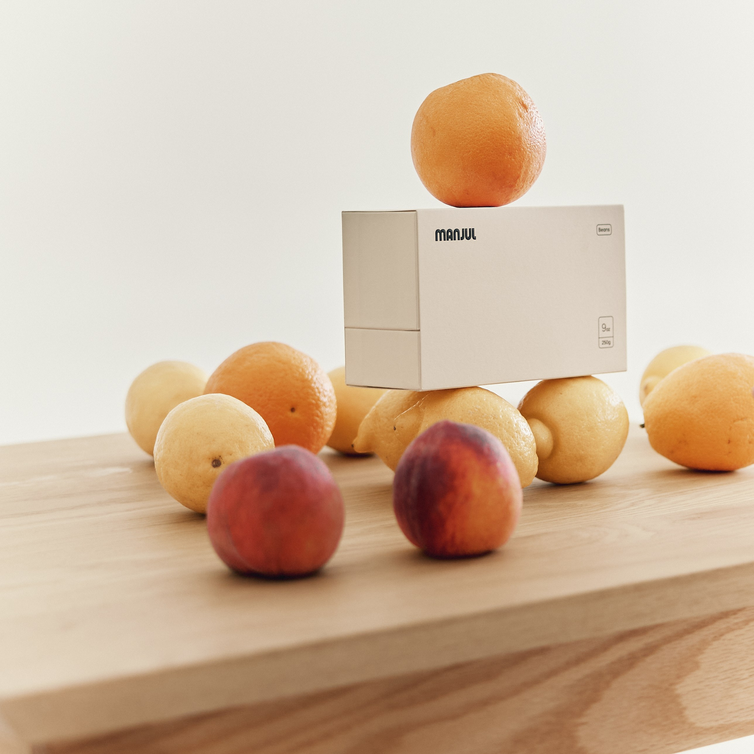 Styled still life with fresh fruit on a wooden table by Kovyphoto
