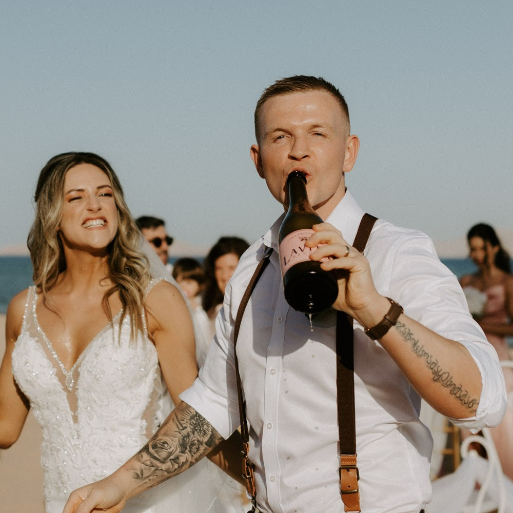 Bride and groom review of a wedding photoshoot