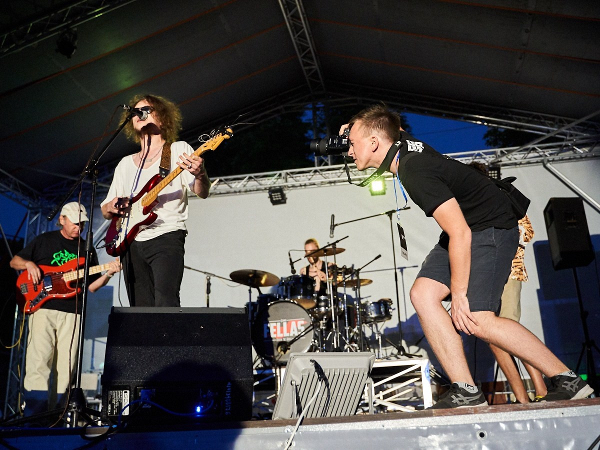 Live band performing on stage with instruments