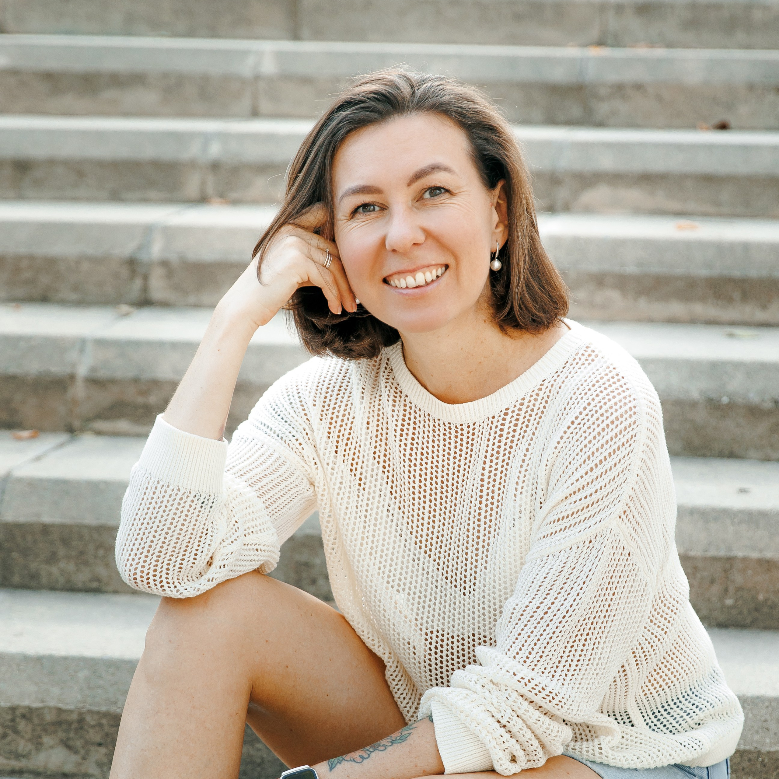 Barcelona destination wedding photographer Lana smiling in natural light studio