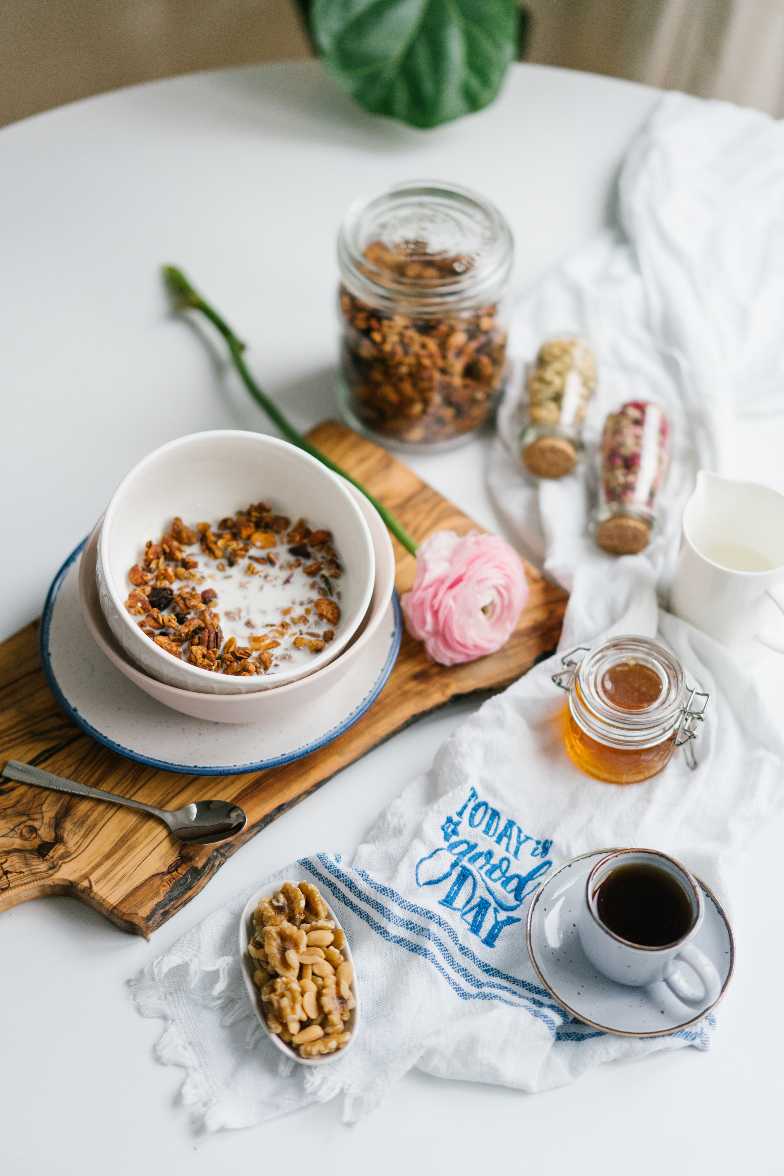 Breakfast set up with flowers and towels on the table