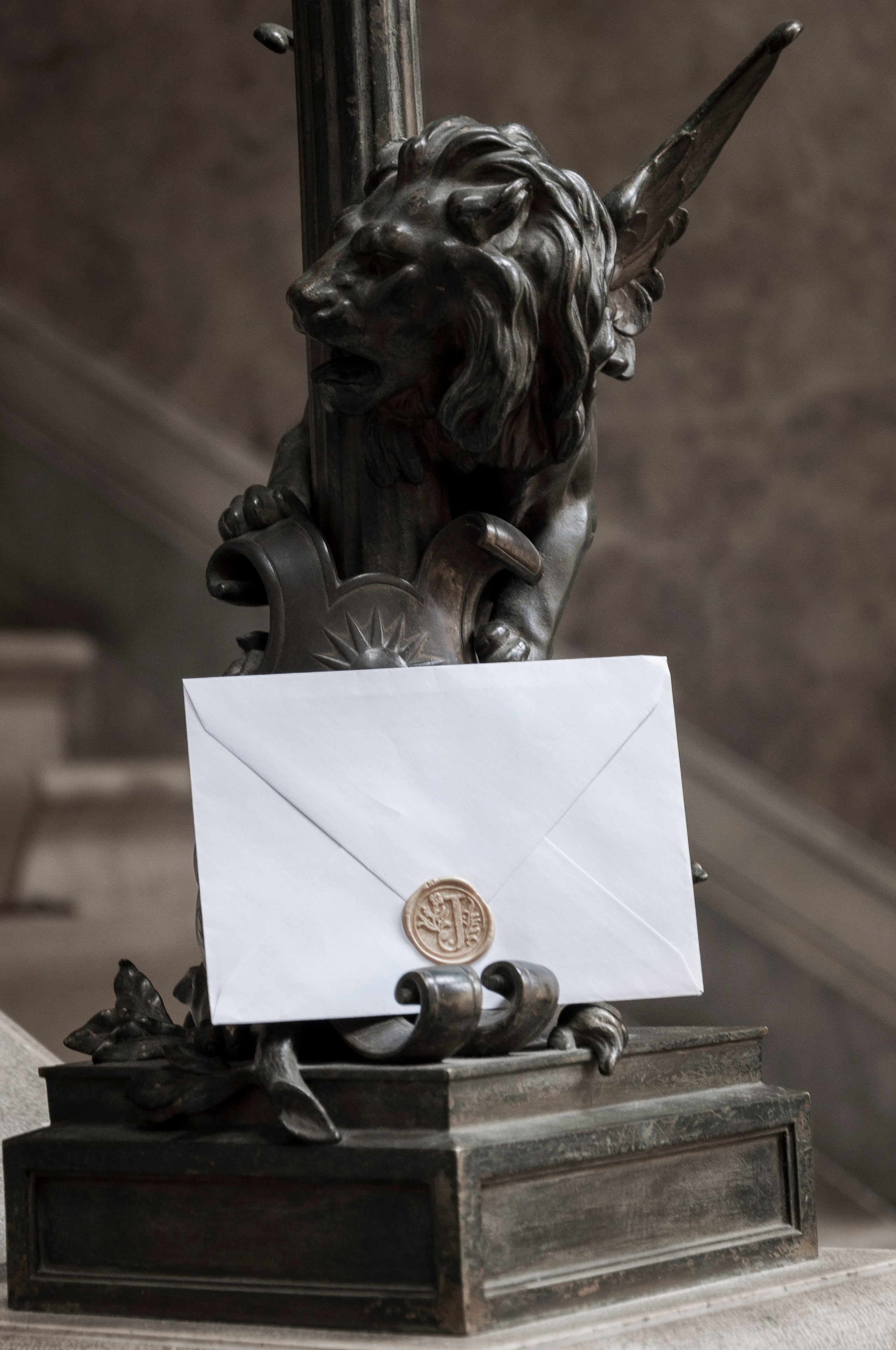 A luxurious envelope featuring an elegant golden seal, designed to enhance branding and marketing efforts, symbolizing sophistication and exclusivity.