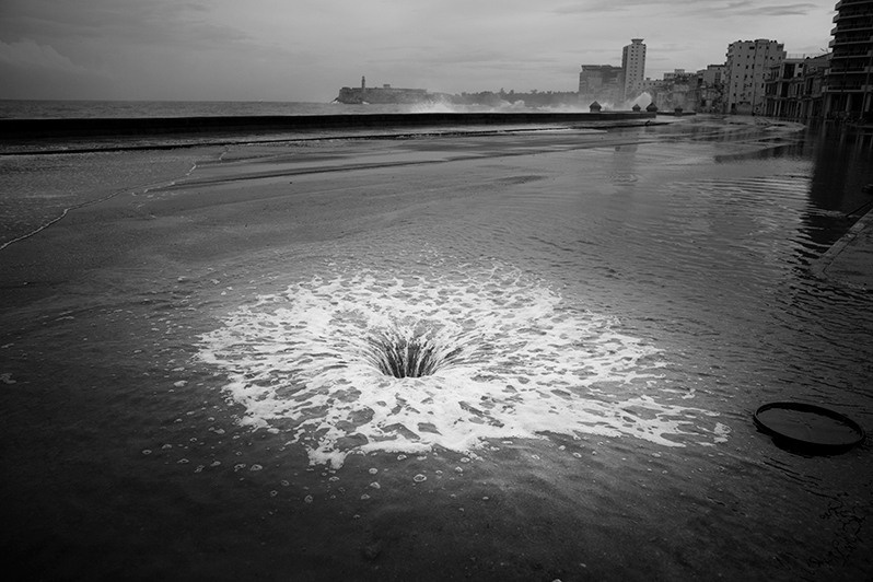Crater in the sea during Hurricane Ian on the lower Havana coast, Malecón promenade, Centro Habana district, Havana, Cuba. 2022