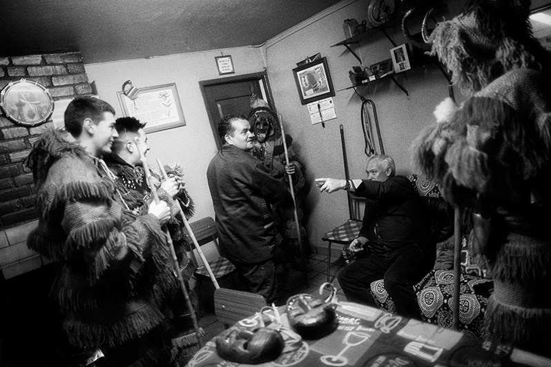 The “Caretos” during the “ronda” inside a village house, Bragança municipality, Bragança district, Trás-os-Montes region, Portugal. 2019