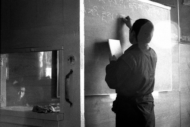 Tibetan lama - foreign language teacher at the Ivolginsky Datsan Centre, Verkhnyaya Ivolga village, Buryatia, Russia. November 2001