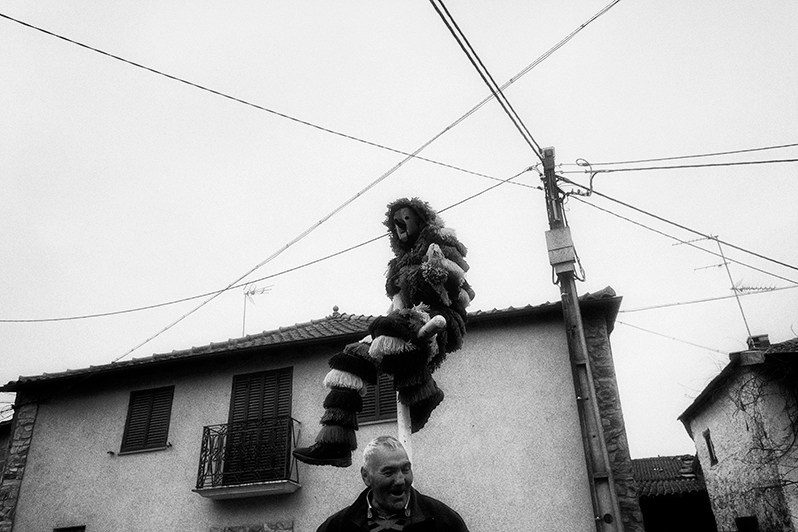 “Careto” is placed on top of a cross in the village square, Bragança municipality, Bragança district, Trás-os-Montes region, Portugal. 2022