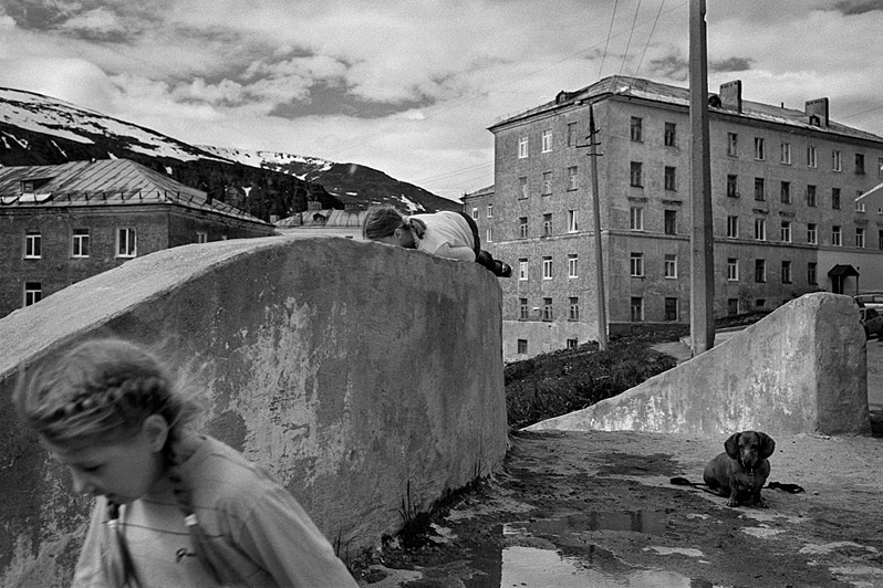 Two girls and a dog, Kirovsk, Murmansk region, Russia. 2014
