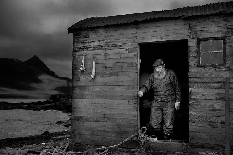 Kristin Hallur Jonsson prepares her farm in Drangar for winter and packs her things to go to Bolungarvik for the winter, Drangar farm, Strandir district, Westfjords region, Iceland. 1994