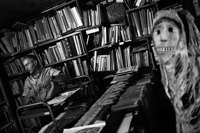 Priest Fontes in his home library, Montalegre municipality, Vila Real district, Trás-os-Montes region, Portugal. 2018