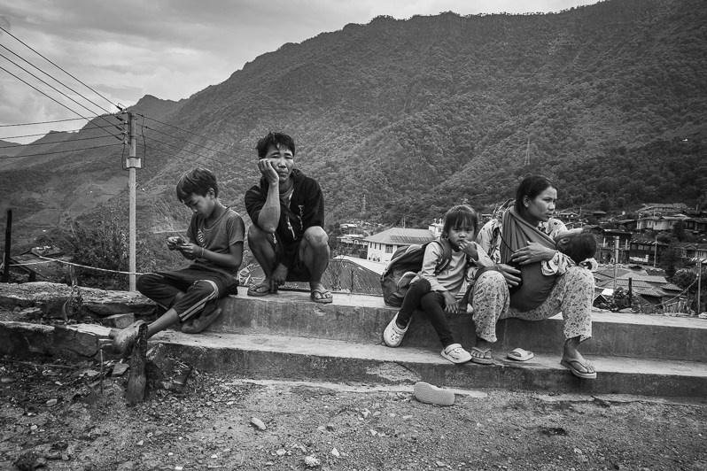 Chin villagers in Ramlau village on the main road between Falam to Hakha, Ramlau village, Falam township, Chin state, Myanmar. May 2023