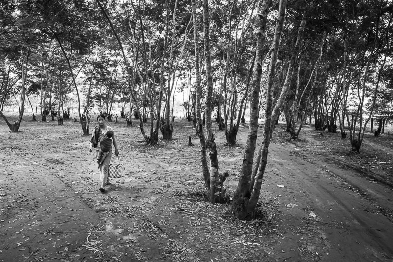 A Kachin woman and her child at St Joseph's IDP camp, which has housed over 2,000 people since 2011, Myitkyina, Kachin state, Myanmar. September 2019