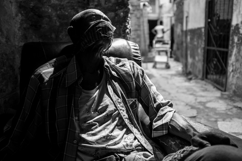 Portrait of a man from a neighbourhood community during quarantine due to the Covid-19 pandemic, Centro Habana district, Havana, Cuba. 2020