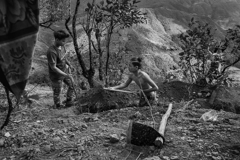 Chin National Defence Forces (CNDT) digging trenches on the frontline overlooking Tatmadaw positions in Falam Township, Chin State, Myanmar. November 2022