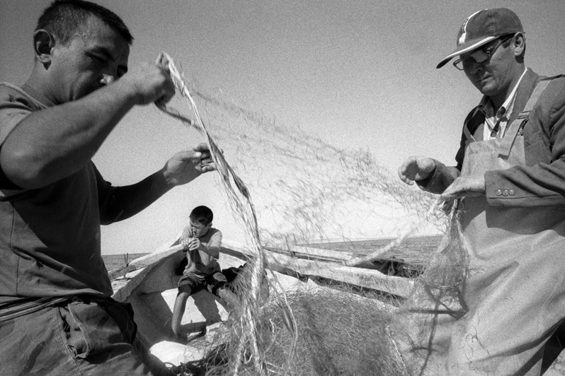 Fishing today, Lake area around Tastubek, Aralsk district, Kyzyl-Orda region, Kazakhstan. August 2001