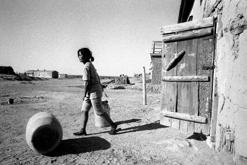 Everyday the same task, Tastubek village, Aralsk district, Kyzyl-Orda region, Kazakhstan. August 2001