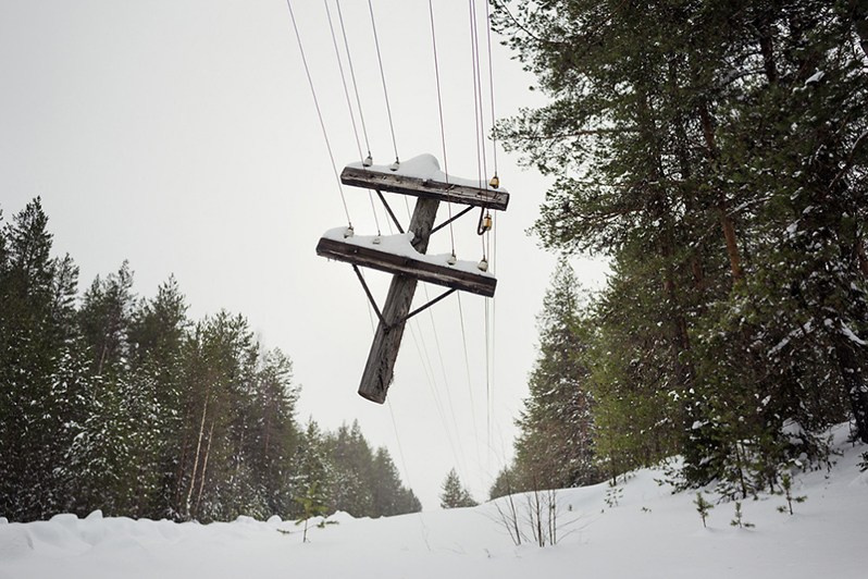 A telegraph-pole cut for firewood by locals, between Rusoma village and Ust'-Chulasa settlement, Leshukonsky district, Arkhangelsk region, Russia. 2018