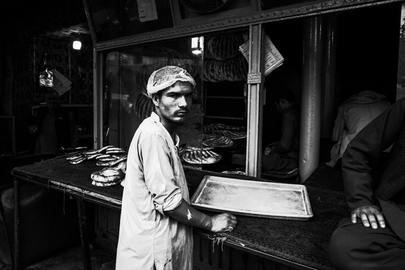 Poultry seller at the central market, Kabul, Afghanistan. 2024