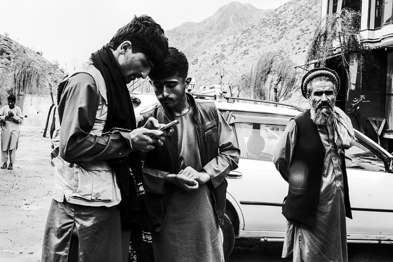 Afghans studying in detail the route through the Salang Pass, Hindu Kush mountain system, Afghanistan. 2024