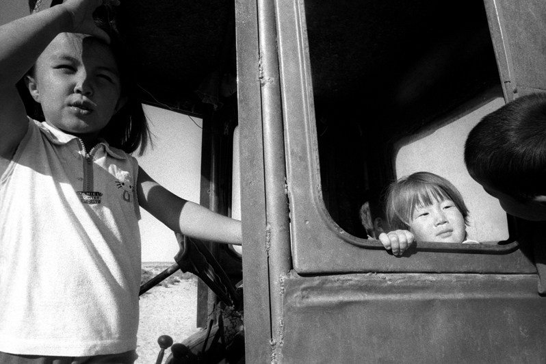 Tractor playground, Tastubek village, Aralsk district, Kyzylorda region, Kazakhstan. August 2001