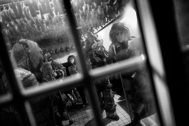 The “Caretos” try to steal some type of chorizo, Bragança municipality, Bragança district, Trás-os-Montes region, Portugal. 2020