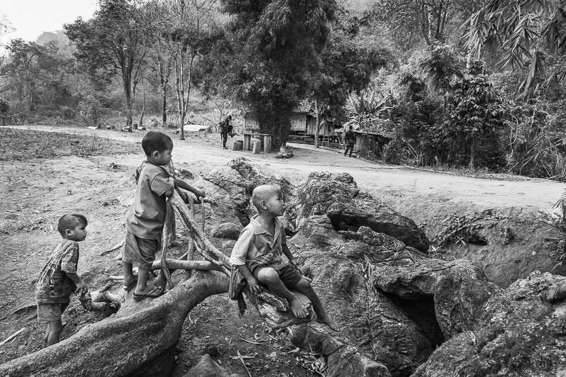 Children of Karen combattants playing near the KNDO Headquarters, Kayin state, Myanmar. March 2019