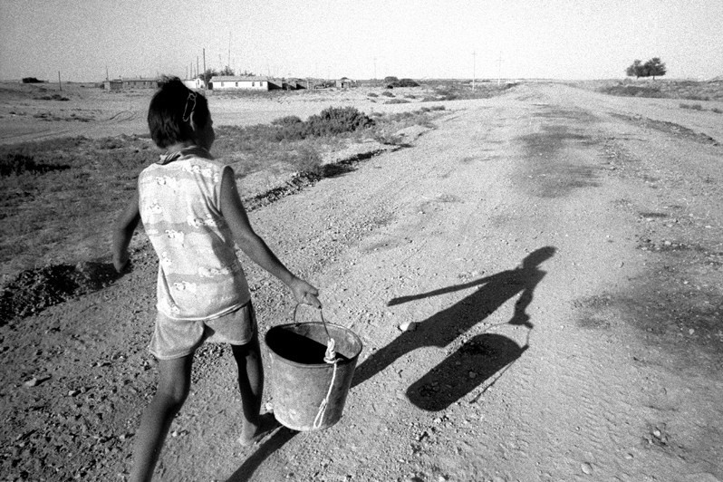 A child in the Aral desert, Bogen village, Aralsk district, Kyzyl-Orda region, Kazakhstan. August 2001