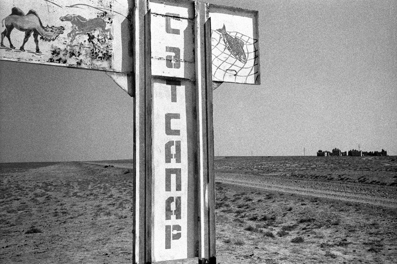 Road signpost, Zhalanash village, Aralsk district, Kyzyl-Orda region, Kazakhstan. August 2001