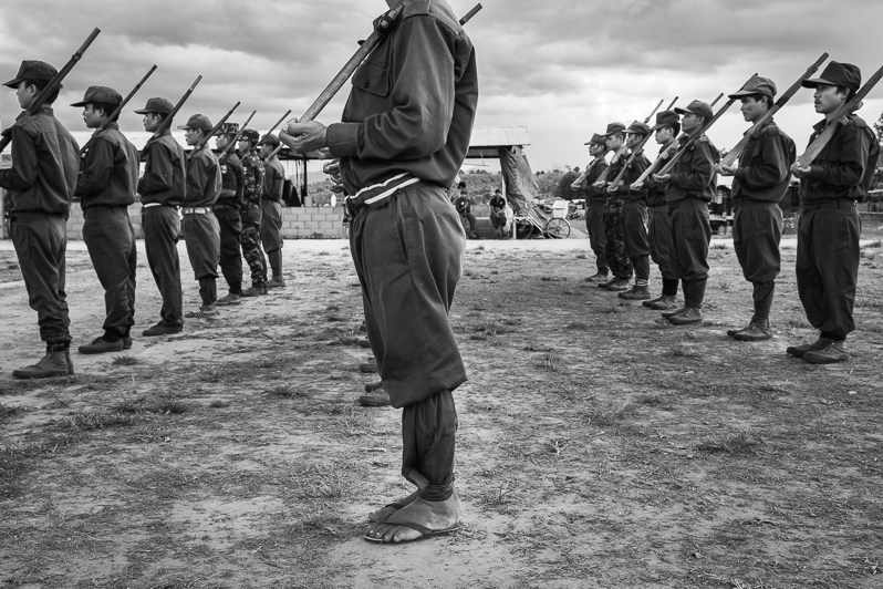 Democratic Karen Buddist Army (DKBA) parade repetition with wooden nep guns, Kayin state, Myanmar. November 2018