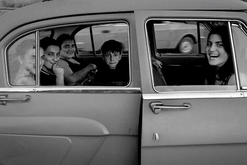 A Georgian family in a Volga car, Tbilisi, Georgia. April 1992 © Oleg Klimov