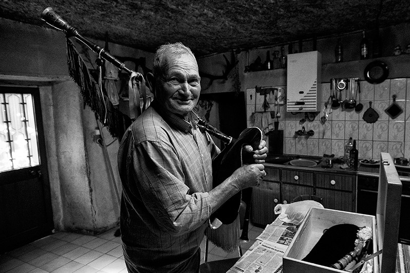Bagpipe player in his dwelling, Bragança district, Trás-os-Montes region, Portugal. 2012