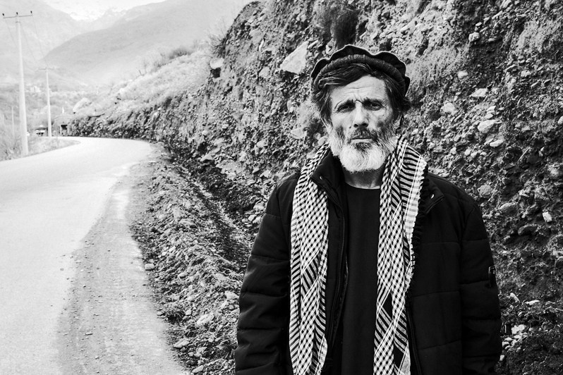 Portrait of an elderly Afghan man who still remembers the brutal battles with the Soviets, Panjshir Valley, Afghanistan. 2024