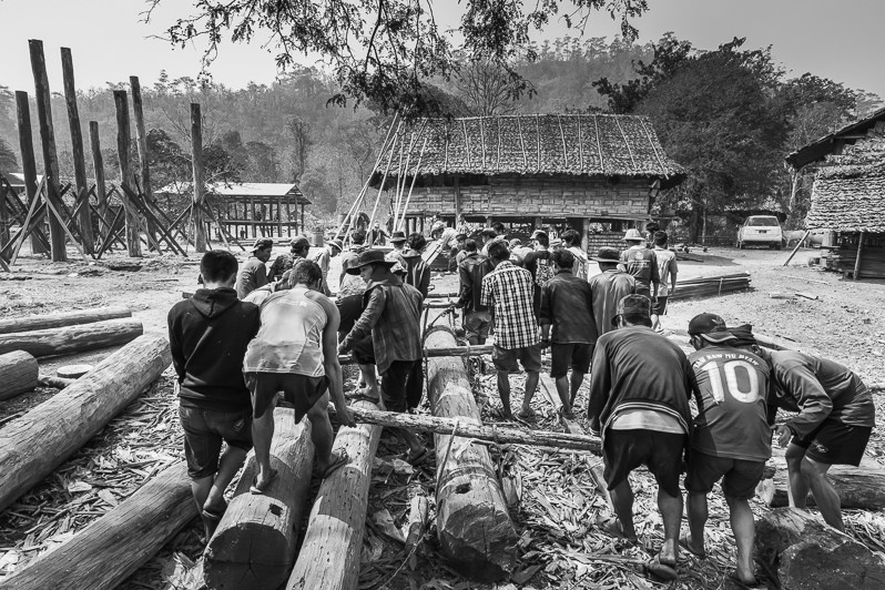 Karen villagers building a house with local timber, Taotah village, Kayin state, Myanmar. March 2019