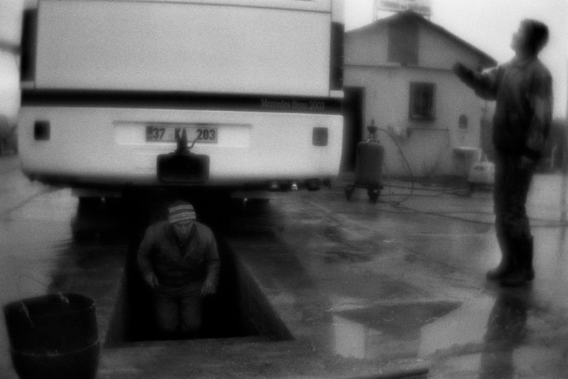 Long-distance bus washing, near Tosya, Kastamonu province, Turkey. January 2011
