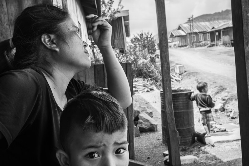 Internally displaced family from Thantlang, a town that has been totally destroyed and where heavy fighting between the Chin National Army and the Myanmar military is ongoing, Thangklua village, Chin state, Myanmar. June 2023