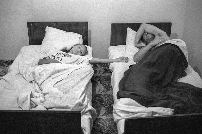 A woman and a man at the "Batumi" Hotel, Vladimir Mayakovsky street, Batumi, Georgia. 1995 © Oleg Klimov