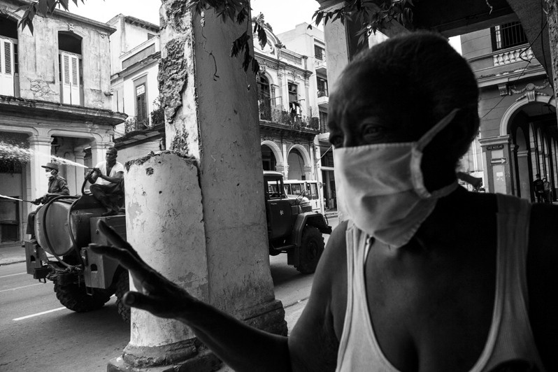 Fumigation to sterilise streets due to presence of virus in Havana, Reina street, Centro Habana district, Havana, Cuba. 2020